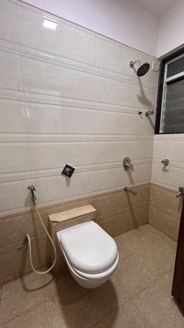 Bathroom in 1 BHK Apartment at Man Opus, Mira Road – for Rent