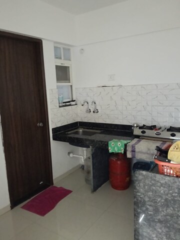 Kitchen in 2 BHK Apartment at Majestique Mrugavarsha, Dhayari – for Rent