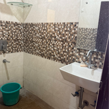 Bathroom in 3 BHK Builder Floor at Boutique Residential Apartments C-220, Sarvodaya Enclave – for Rent