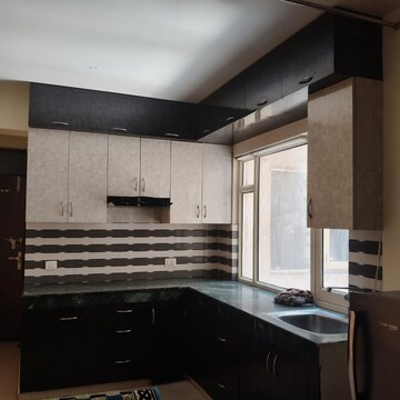 Kitchen in 2 BHK Apartment at ROF Aalayas, Sector 102 – for Rent