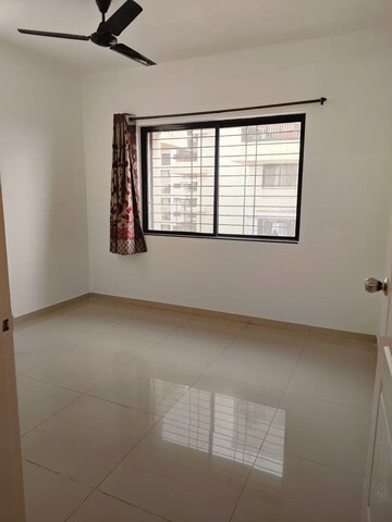Room in 2 BHK Apartment at Kolte Patil Umang Premiere, Wagholi – for Rent