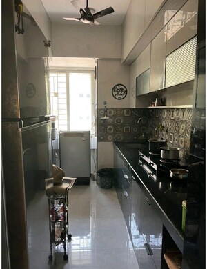 Kitchen in 2 BHK Apartment at Squarefeet Green Square, Parkwoods – for Sale