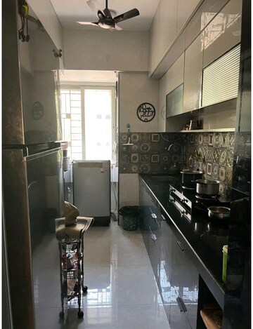 Kitchen in 2 BHK Apartment at Squarefeet Green Square, Parkwoods – for Sale