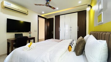 Bedroom in 4 BHK Builder Floor at Defence Colony – for Rent