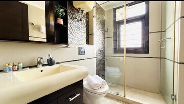 Bathroom in 4 BHK Builder Floor at Defence Colony – for Rent