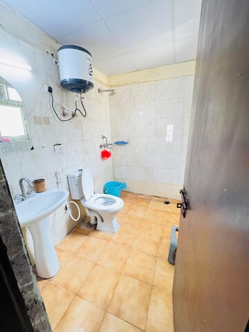 Bathroom in 2.5 BHK Apartment at Aims Golf City, Sector 75 – for Rent