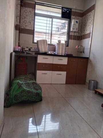Kitchen in 2 BHK Apartment at Manorama Nagar CHS, Badlapur East – for Sale