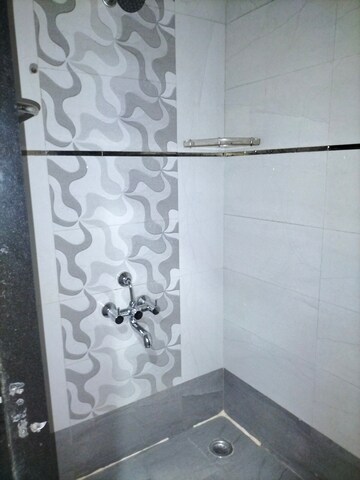 Bathroom in 1 BHK Apartment at Shankar Darshan CHS, Dhankawadi – for Rent