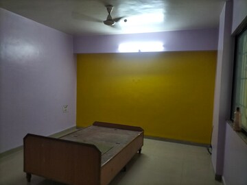 Bedroom in 2 BHK Apartment at Green Natraj Residency, Dhankawadi – for Rent