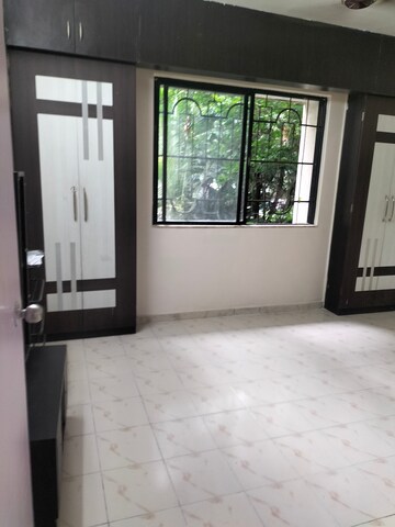 Room in 2 BHK Apartment at Green Natraj Residency, Dhankawadi – for Rent