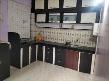 Kitchen in 2 BHK Apartment at Green Natraj Residency, Dhankawadi – for Rent