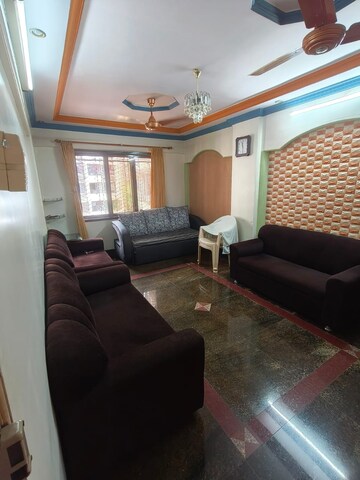 Living Room in 2 BHK Apartment at Gokul Nagari 1, Kandivali East – for Rent