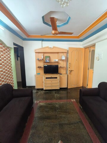Living Room in 2 BHK Apartment at Gokul Nagari 1, Kandivali East – for Rent