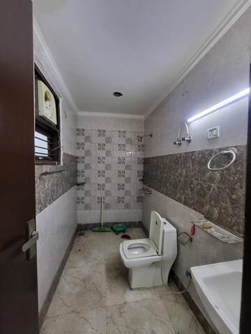 Bathroom in 2 BHK Builder Floor at Green Fields Colony – for Rent