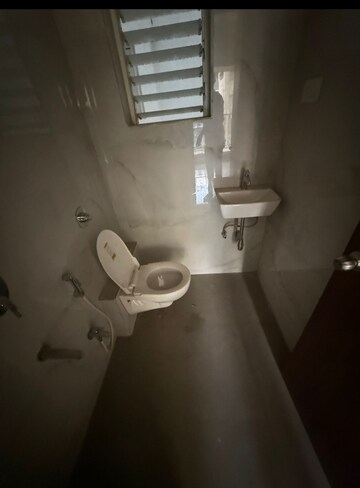 Bathroom in 3 BHK Apartment at Satyam CHS Naupada, Naupada – for Rent