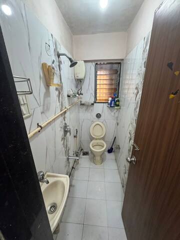 Bathroom in 1 BHK Apartment at Gurukrupa Marina Enclave, Malad West – for Rent