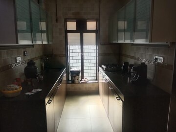 Kitchen in 3 BHK Apartment at Je And Vee Om Trimurti, Malad East – for Rent