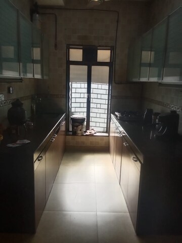 Kitchen in 3 BHK Apartment at Je And Vee Om Trimurti, Malad East – for Rent