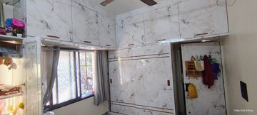 Kitchen in 2 BHK Apartment at Agarsen CHS, Koregaon – for Rent