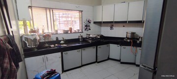 Kitchen in 2 BHK Apartment at Agarsen CHS, Koregaon – for Rent