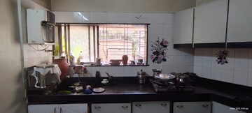 Kitchen in 2 BHK Apartment at Agarsen CHS, Koregaon – for Rent