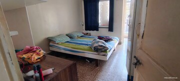 Bedroom in 2 BHK Apartment at Agarsen CHS, Koregaon – for Rent