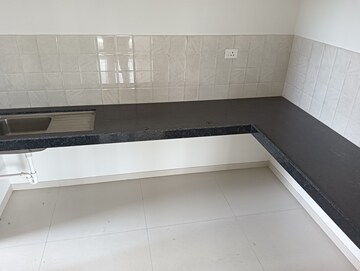 Kitchen in 2 BHK Apartment at Shapoorji Pallonji Sensorium, Hinjewadi – for Rent