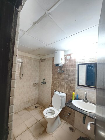 Bathroom in 2 BHK Apartment at Aims Golf City, Sector 75 – for Rent