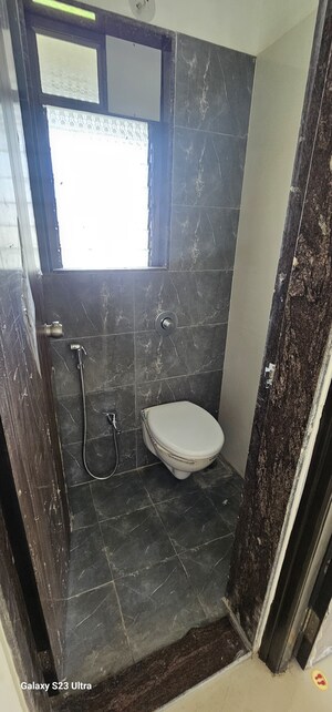 Bathroom in 1 BHK Apartment at Veena Smart Homes, Kandivali West – for Sale