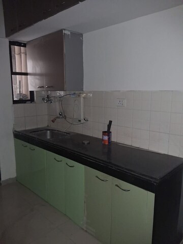 Kitchen in 2 BHK Apartment at Nagpal Dev Exotica, Kharadi – for Rent