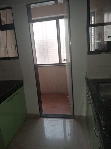 Kitchen in 2 BHK Apartment at Nagpal Dev Exotica, Kharadi – for Rent