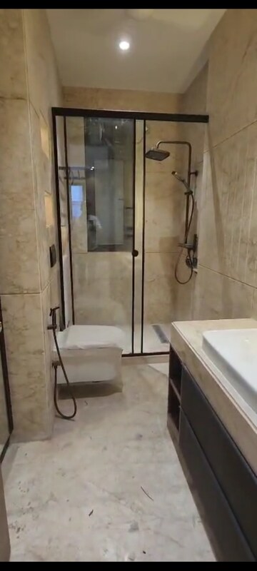 Bathroom in 3 BHK Apartment at Defence Colony – for Sale