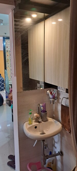 Living Room in 2 BHK Apartment at Zinnia Elegance, Wakad – for Sale