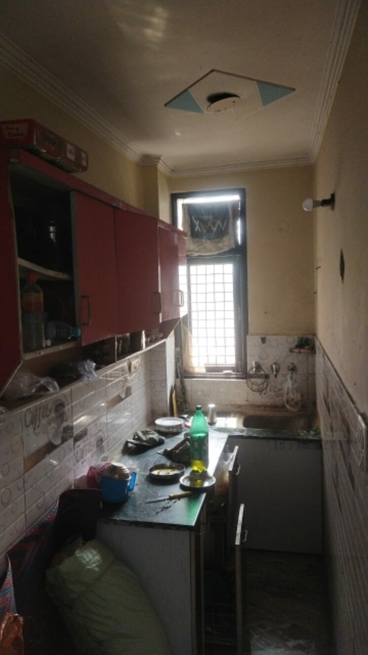 Kitchen, mansa ram park 2 Bedroom 50 Sq.Yd. Builder Floor In Mansa Ram Park Delhi 9089651