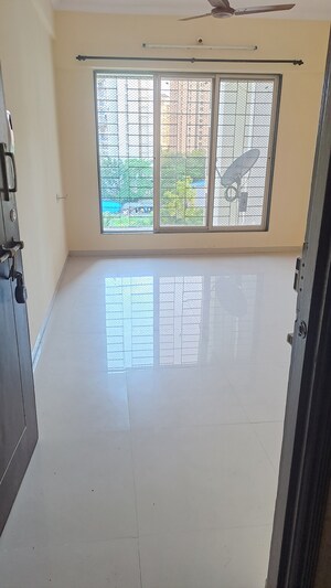 Room in 2 BHK Apartment at Coral Heights, Kavesar – for Sale