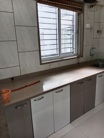 Kitchen in 3 BHK Apartment at Nexus Hyde Park Residency, Manpada – for Rent