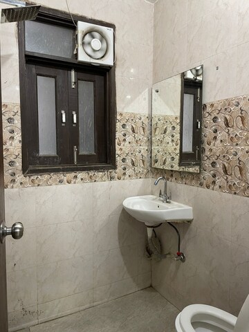 Bathroom in 1 BHK Builder Floor at Freedom Fighters Enclave – for Rent