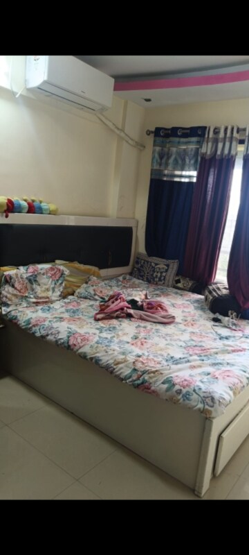 Bedroom in 2 BHK Apartment at Jay Surabhi Aparment, Kanakia Road – for Rent