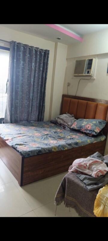 Bedroom in 2 BHK Apartment at Jay Surabhi Aparment, Kanakia Road – for Rent