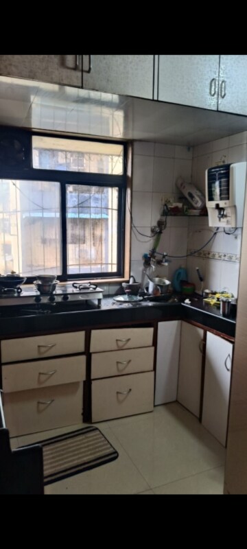 Kitchen in 2 BHK Apartment at Jay Surabhi Aparment, Kanakia Road – for Rent