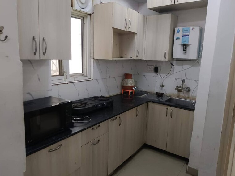Kitchen, sam-palm-olympia 3 Bedroom 1357 Sq.Ft. Apartment In Sector 16c Greater Noida Greater Noida 9090008
