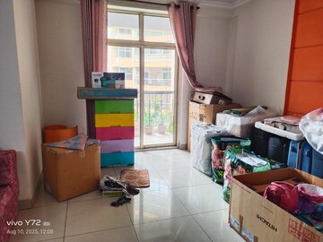 Living Room in 2 BHK Apartment at Mahagun Mascot, Sain Vihar – for Rent