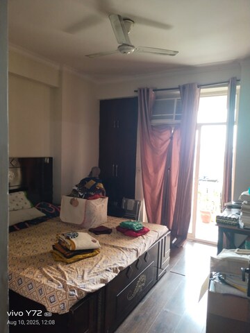 Living Room in 2 BHK Apartment at Mahagun Mascot, Sain Vihar – for Rent