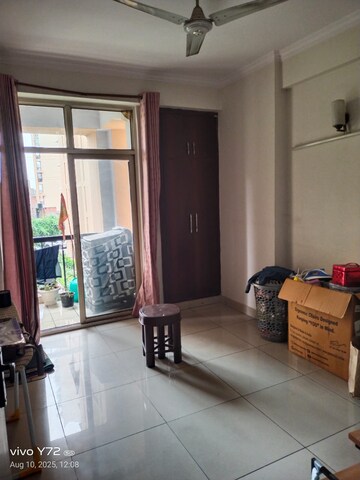 Living Room in 2 BHK Apartment at Mahagun Mascot, Sain Vihar – for Rent