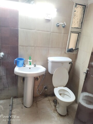 Bathroom in 2 BHK Apartment at Mahagun Mascot, Sain Vihar – for Rent