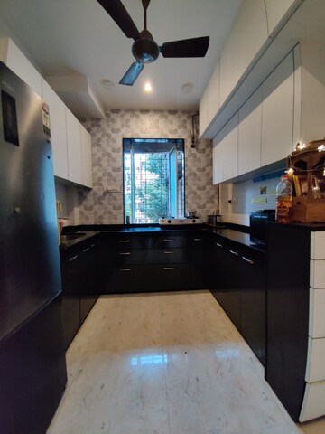 Kitchen in 2 BHK Apartment at Omkar Raga, Chembur – for Rent