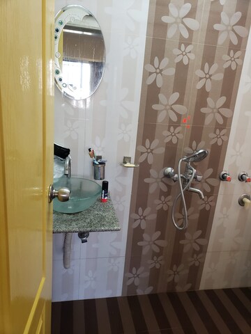 Bathroom in 2 BHK Apartment at Cirrus CHSL Cosmos Paradise, Vasant Vihar – for Rent