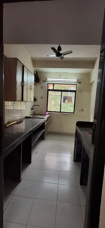 Kitchen in 2 BHK Apartment at Dheeraj Ganga, Malad West – for Rent