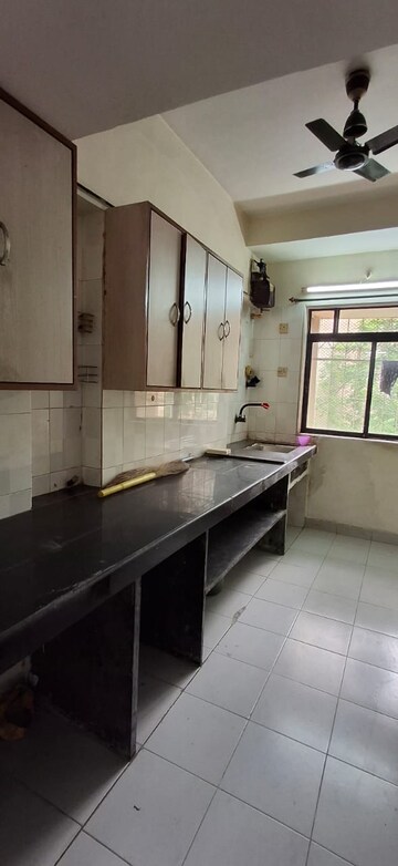 Kitchen in 2 BHK Apartment at Dheeraj Ganga, Malad West – for Rent