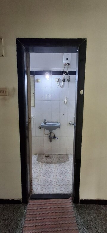 Bathroom in 2 BHK Apartment at Dheeraj Ganga, Malad West – for Rent